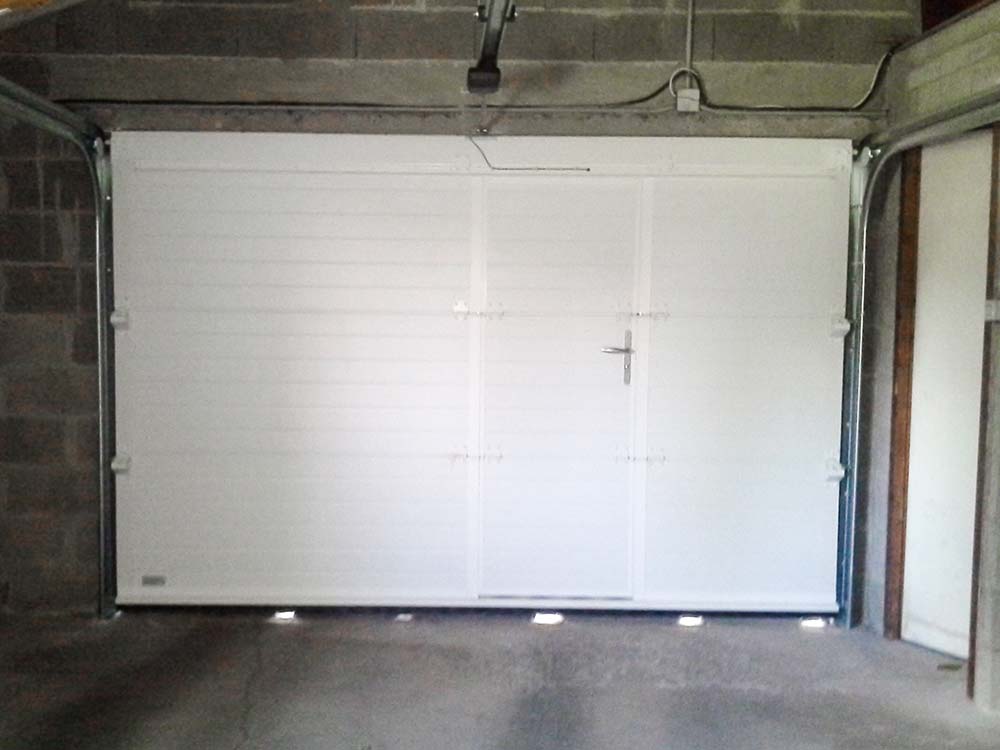 Porte de garage motorisée - Sectionnelle, battante